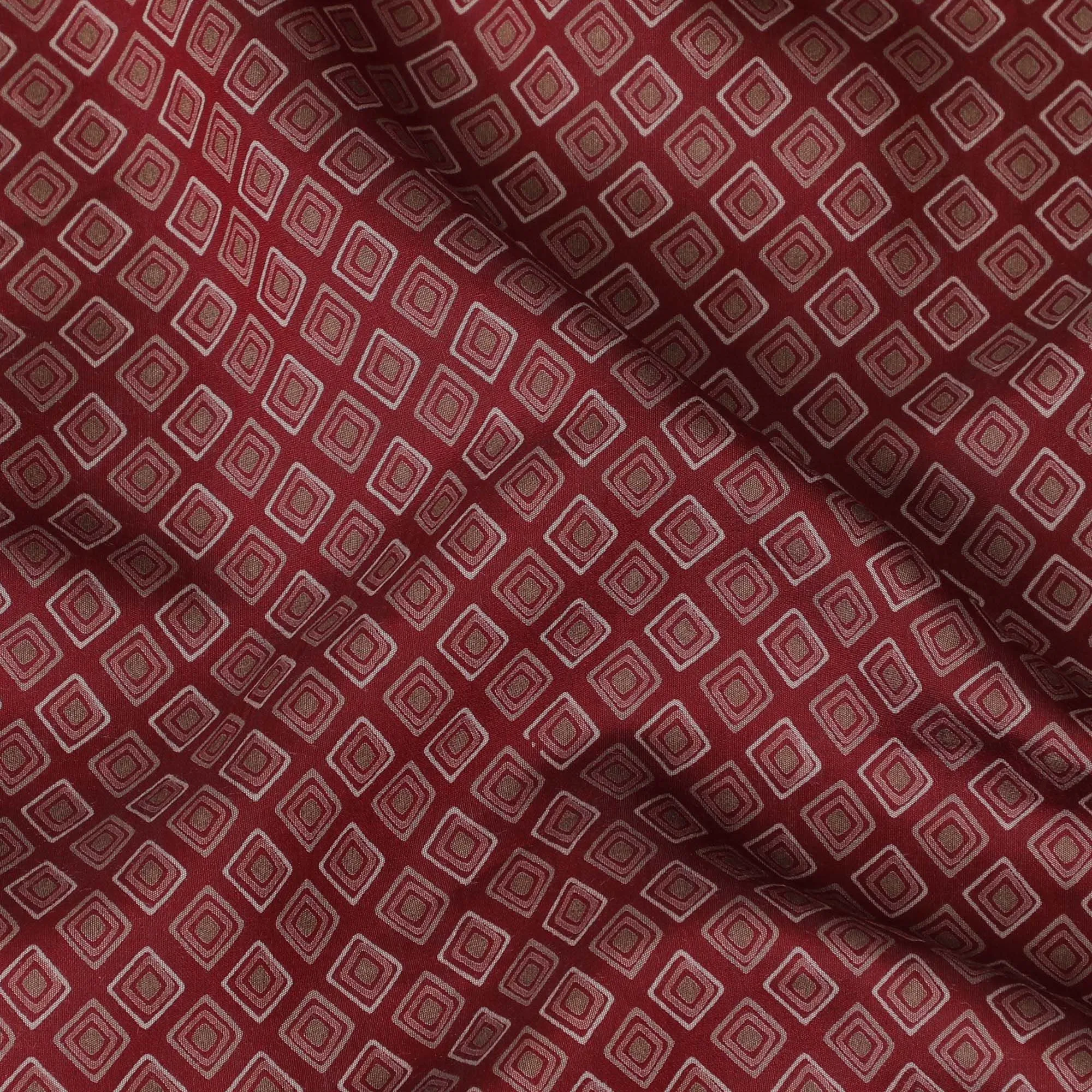 Maroon Synthetic blended  cotton fabric with beige, brick red and pale brown print in geometric design-D16737