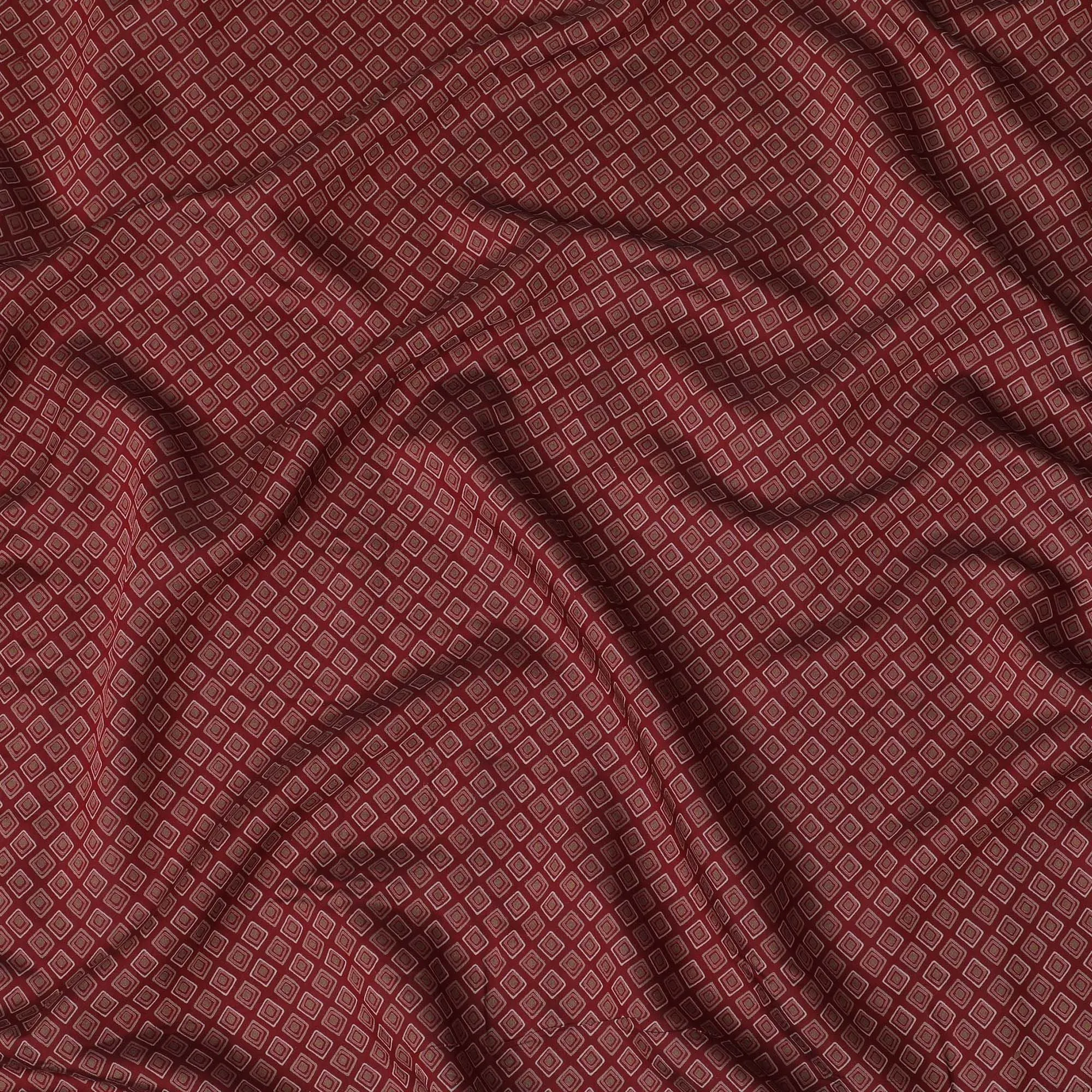 Maroon Synthetic blended  cotton fabric with beige, brick red and pale brown print in geometric design-D16737